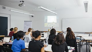 Students in a classroom during E-learning session