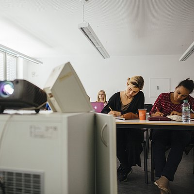 Students in a classroom during E-learning session